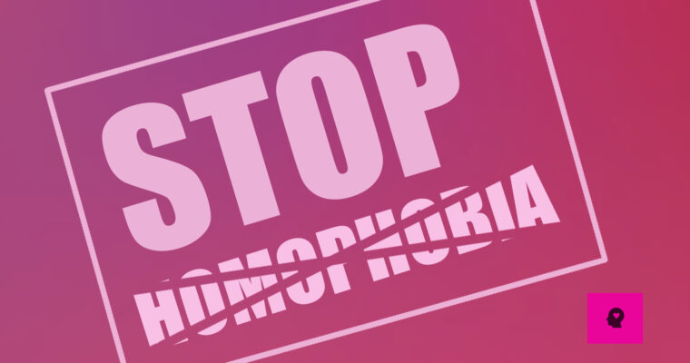 "Stop Homophobia" steht in weiss auf einem rötlichen Hintergrund.